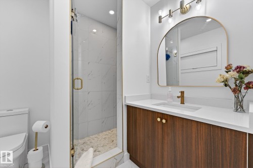 Full bathroom featuring vanity, a marble finish shower, and recessed lighting - 8604 142 Street, Edmonton, AB - Indoor Photo Showing Bathroom