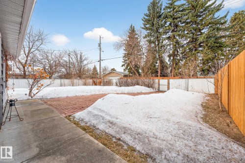 Yard layered in snow featuring a fenced backyard - 8604 142 Street, Edmonton, AB - Outdoor
