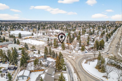 Snowy aerial view with a residential view - 8604 142 Street, Edmonton, AB - Outdoor With View