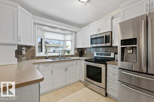 9512 147 Avenue, Edmonton, AB - Indoor Photo Showing Kitchen With Double Sink