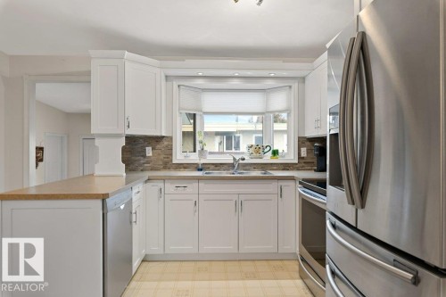 9512 147 Avenue, Edmonton, AB - Indoor Photo Showing Kitchen With Double Sink