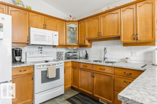 8 95 Gervais Road, St. Albert, AB - Indoor Photo Showing Kitchen With Double Sink