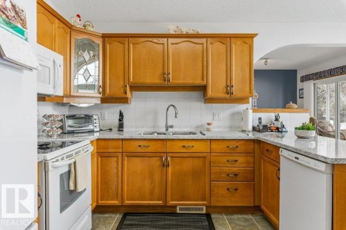 8 95 Gervais Road, St. Albert, AB - Indoor Photo Showing Kitchen With Double Sink