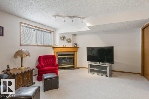 8 95 Gervais Road, St. Albert, AB - Indoor With Fireplace