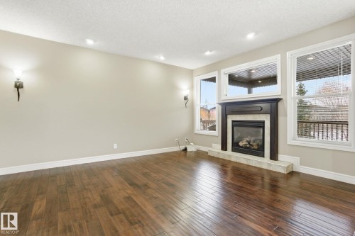 549 Hudson Road, Edmonton, AB - Indoor Photo Showing Living Room With Fireplace