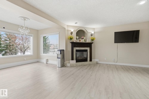 549 Hudson Road, Edmonton, AB - Indoor Photo Showing Living Room With Fireplace