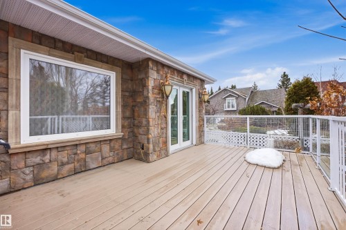Spacious outdoor deck with a sturdy railing, providing an elevated view - 131 Walsh Crescent, Edmonton, AB - Outdoor With Deck Patio Veranda With Exterior