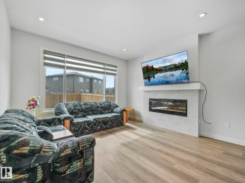 1143 Plum Lane, Edmonton, AB - Indoor Photo Showing Living Room With Fireplace