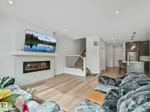 1143 Plum Lane, Edmonton, AB - Indoor Photo Showing Living Room With Fireplace