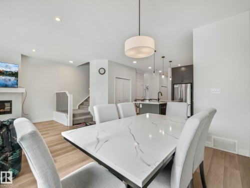 1143 Plum Lane, Edmonton, AB - Indoor Photo Showing Other Room With Fireplace