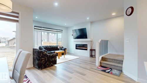 1143 Plum Lane, Edmonton, AB - Indoor Photo Showing Living Room With Fireplace