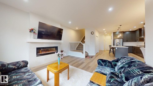 1143 Plum Lane, Edmonton, AB - Indoor Photo Showing Living Room With Fireplace