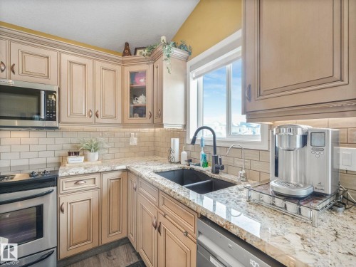 16412 61 Street, Edmonton, AB - Indoor Photo Showing Kitchen With Double Sink With Upgraded Kitchen
