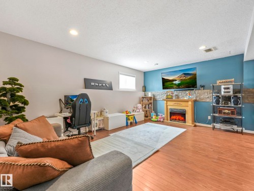 16412 61 Street, Edmonton, AB - Indoor Photo Showing Living Room With Fireplace