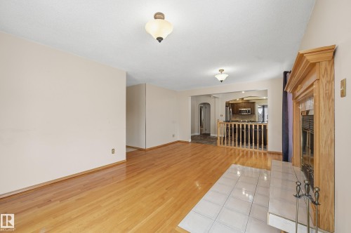 11019 126 Street, Edmonton, AB - Indoor Photo Showing Living Room With Fireplace
