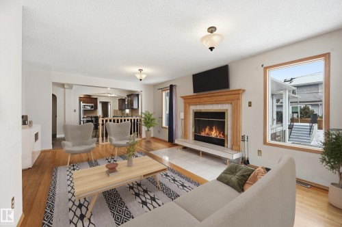 11019 126 Street, Edmonton, AB - Indoor Photo Showing Living Room With Fireplace
