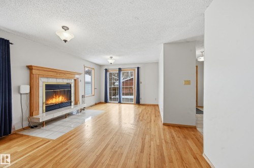 11019 126 Street, Edmonton, AB - Indoor Photo Showing Living Room With Fireplace