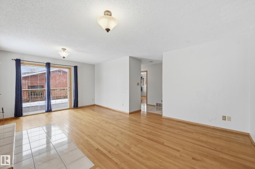 11019 126 Street, Edmonton, AB - Indoor Photo Showing Living Room With Fireplace