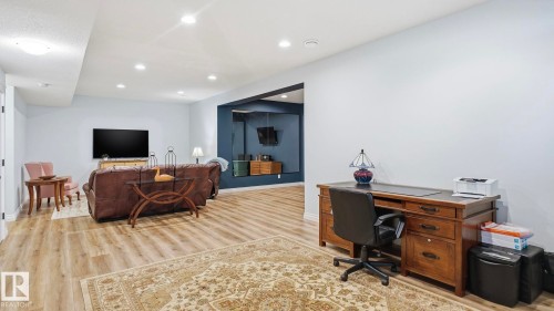 This spacious interior offers light wood-style flooring and recessed lighting - 131 North Ridge Drive, St. Albert, AB - Indoor Photo Showing Office