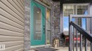 The property features an exterior with horizontal siding and stone accents - 131 North Ridge Drive, St. Albert, AB  - Outdoor With Exterior 