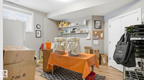 This area features light gray walls, a window with blinds, and durable flooring, providing a versatile space for various uses - 131 North Ridge Drive, St. Albert, AB - Indoor Photo Showing Dining Room