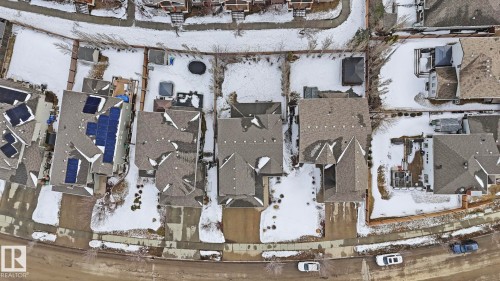 Aerial view of a residential property with a shingled roof, featuring solar panels - 131 North Ridge Drive, St. Albert, AB -  With View