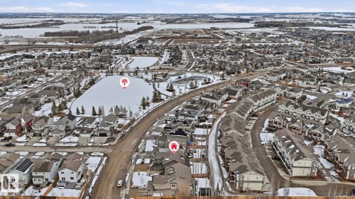 Aerial view of a residential neighbourhood featuring detached homes and townhouses - 131 North Ridge Drive, St. Albert, AB - Outdoor With View