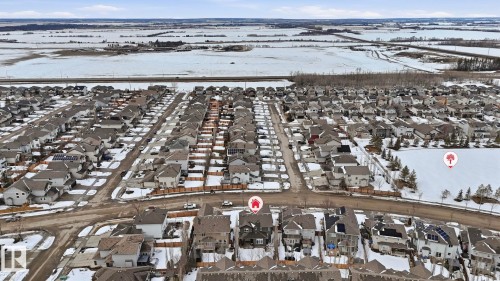 Aerial view of the neighborhood showcasing numerous properties with gray roofs and a wide road - 131 North Ridge Drive, St. Albert, AB - Outdoor With View