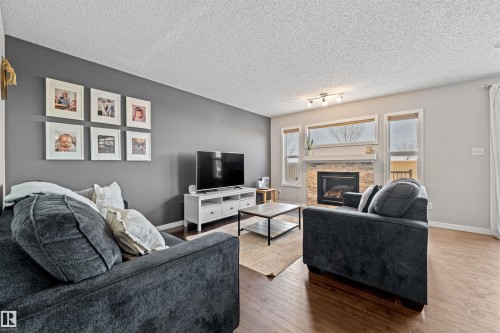 17072 81 Street, Edmonton, AB - Indoor Photo Showing Living Room With Fireplace