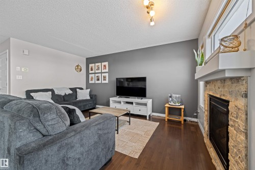 17072 81 Street, Edmonton, AB - Indoor Photo Showing Living Room With Fireplace