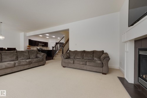 6131 10 Avenue, Edmonton, AB - Indoor Photo Showing Living Room With Fireplace