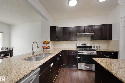 6131 10 Avenue, Edmonton, AB - Indoor Photo Showing Kitchen With Double Sink