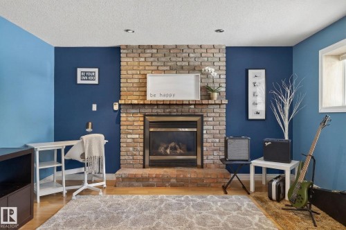 4 Dorset Place, St. Albert, AB - Indoor Photo Showing Living Room With Fireplace