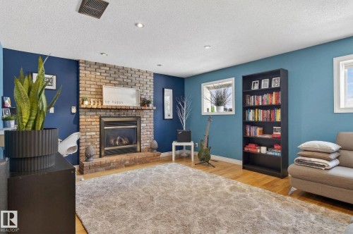 4 Dorset Place, St. Albert, AB - Indoor Photo Showing Living Room With Fireplace