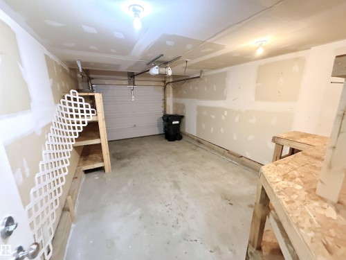 87 Haney Landing, Spruce Grove, AB - Indoor Photo Showing Garage