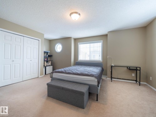 25 8304 11 Avenue, Edmonton, AB - Indoor Photo Showing Bedroom