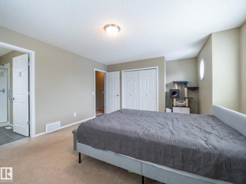 25 8304 11 Avenue, Edmonton, AB - Indoor Photo Showing Bedroom