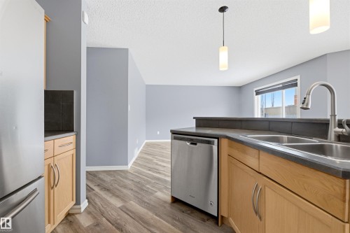 125 Rue Masson, Beaumont, AB - Indoor Photo Showing Kitchen With Double Sink