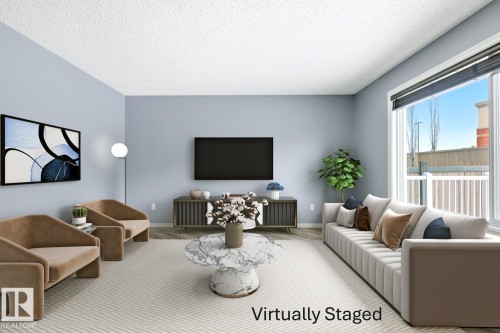 125 Rue Masson, Beaumont, AB - Indoor Photo Showing Living Room