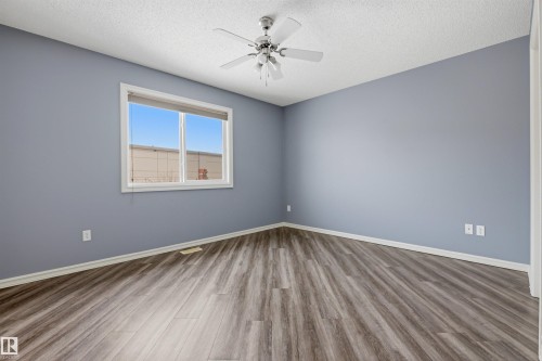125 Rue Masson, Beaumont, AB - Indoor Photo Showing Other Room