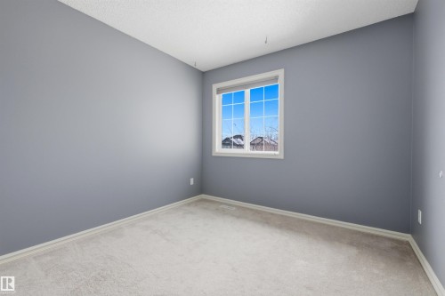 125 Rue Masson, Beaumont, AB - Indoor Photo Showing Other Room
