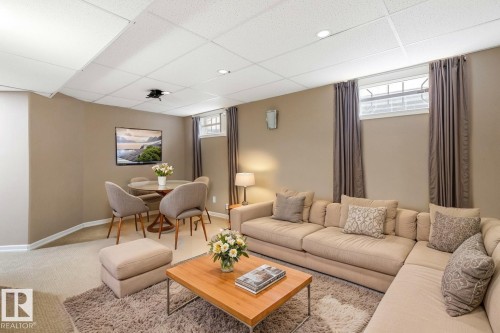 235 River Point(E), Edmonton, AB - Indoor Photo Showing Living Room