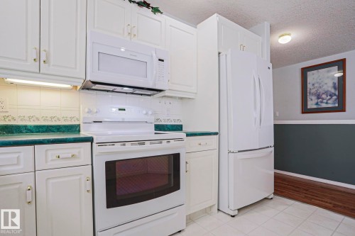 116 Maisonette Village, Leduc, AB - Indoor Photo Showing Kitchen