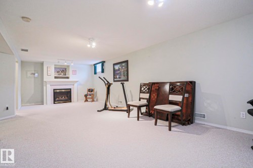 116 Maisonette Village, Leduc, AB - Indoor With Fireplace