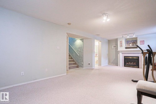 116 Maisonette Village, Leduc, AB - Indoor With Fireplace