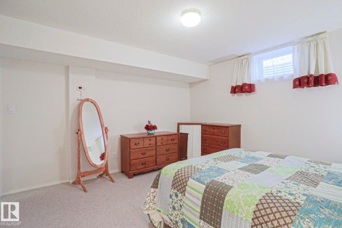116 Maisonette Village, Leduc, AB - Indoor Photo Showing Bedroom