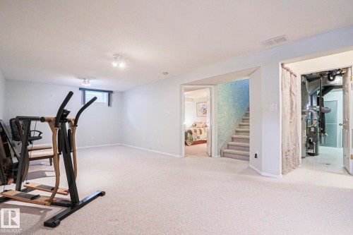 116 Maisonette Village, Leduc, AB - Indoor Photo Showing Gym Room