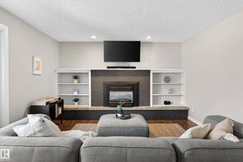 10524 31 Avenue, Edmonton, AB - Indoor Photo Showing Living Room With Fireplace