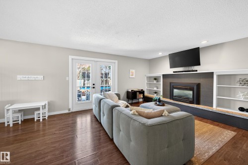 10524 31 Avenue, Edmonton, AB - Indoor Photo Showing Living Room With Fireplace