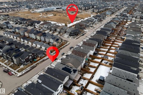 Aerial view of a residential neighbourhood featuring numerous detached properties with sloped roofs and paved streets - 22931 96 Avenue, Edmonton, AB - Outdoor With View